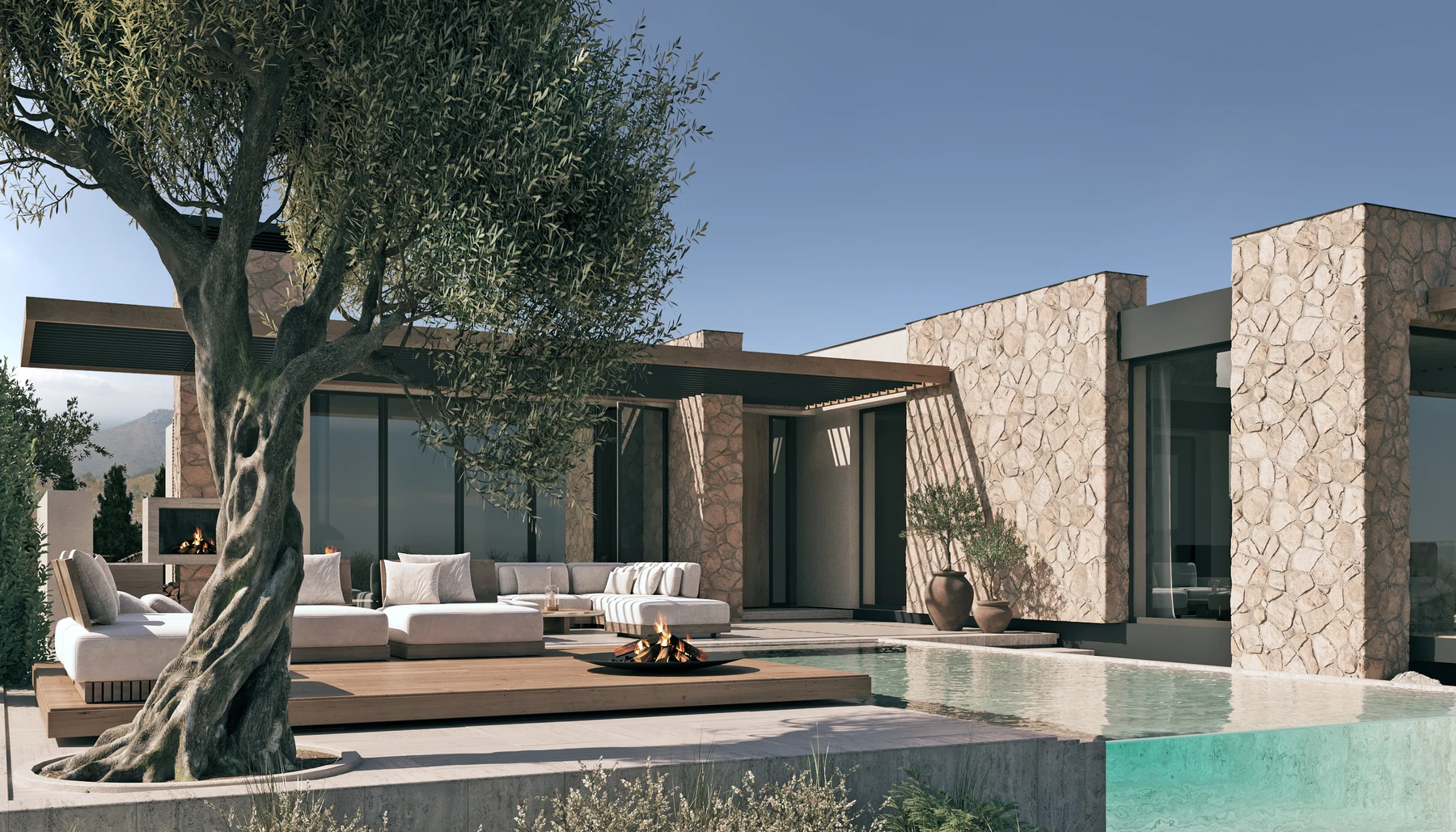 Stone-clad villa with a pool, olive tree and outdoor lounge.